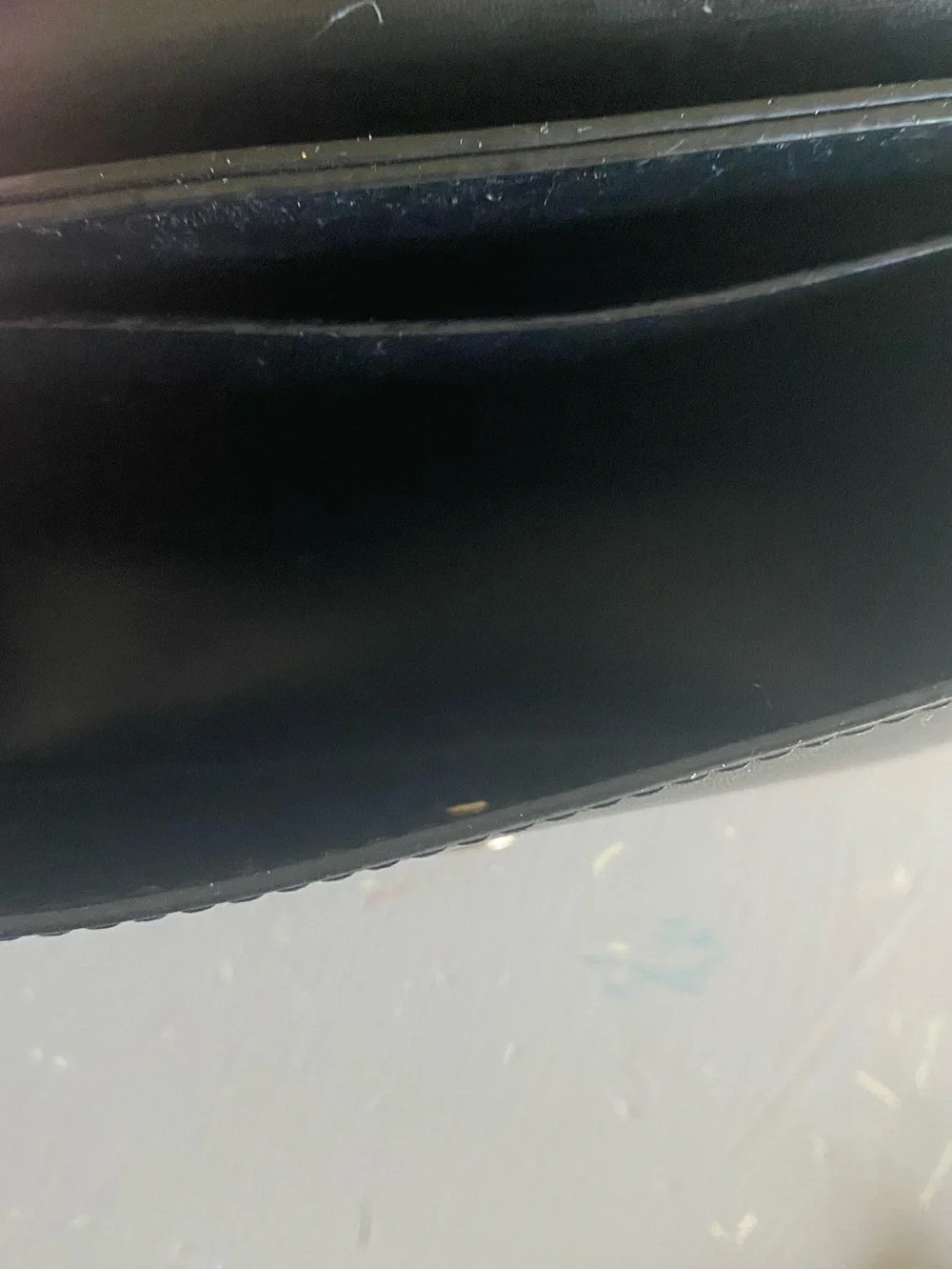 Minimalist Black Leather Crossbody Bag with Gold Accent